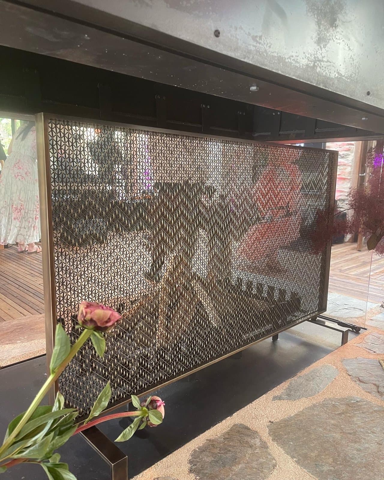 Woven brass mesh screen in a bronze frame