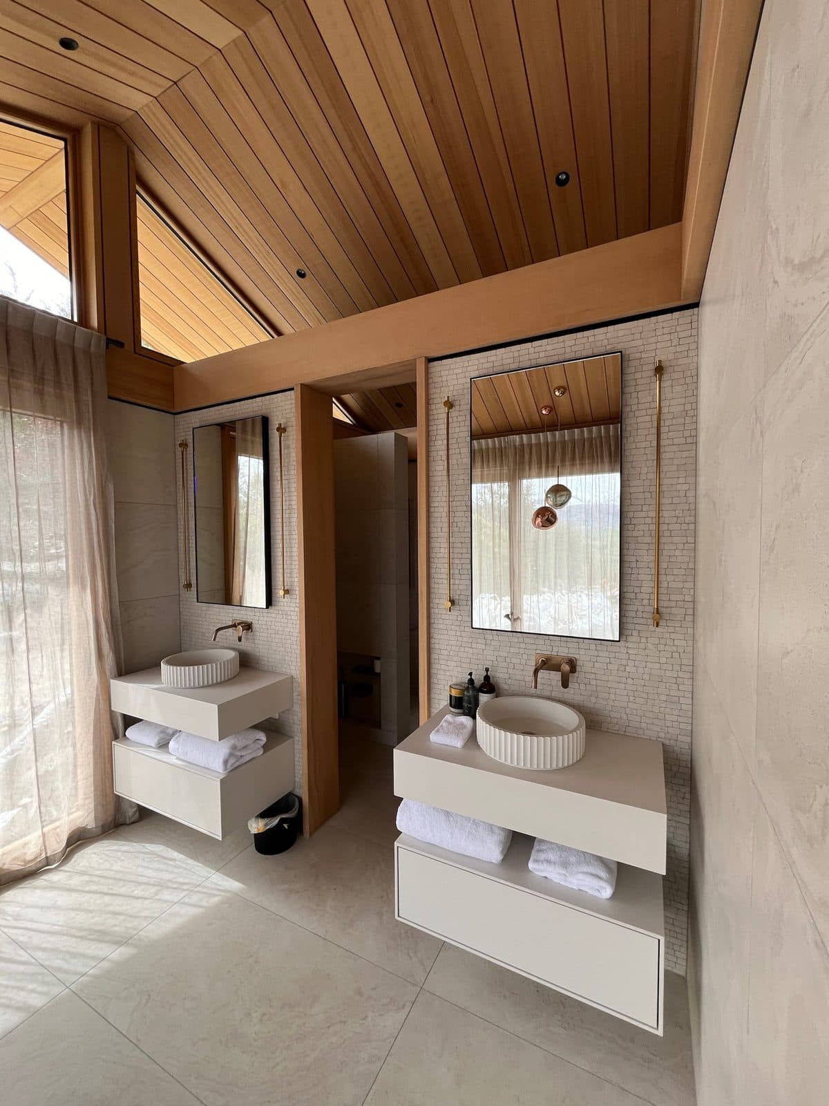Twin vanities seen from the window side